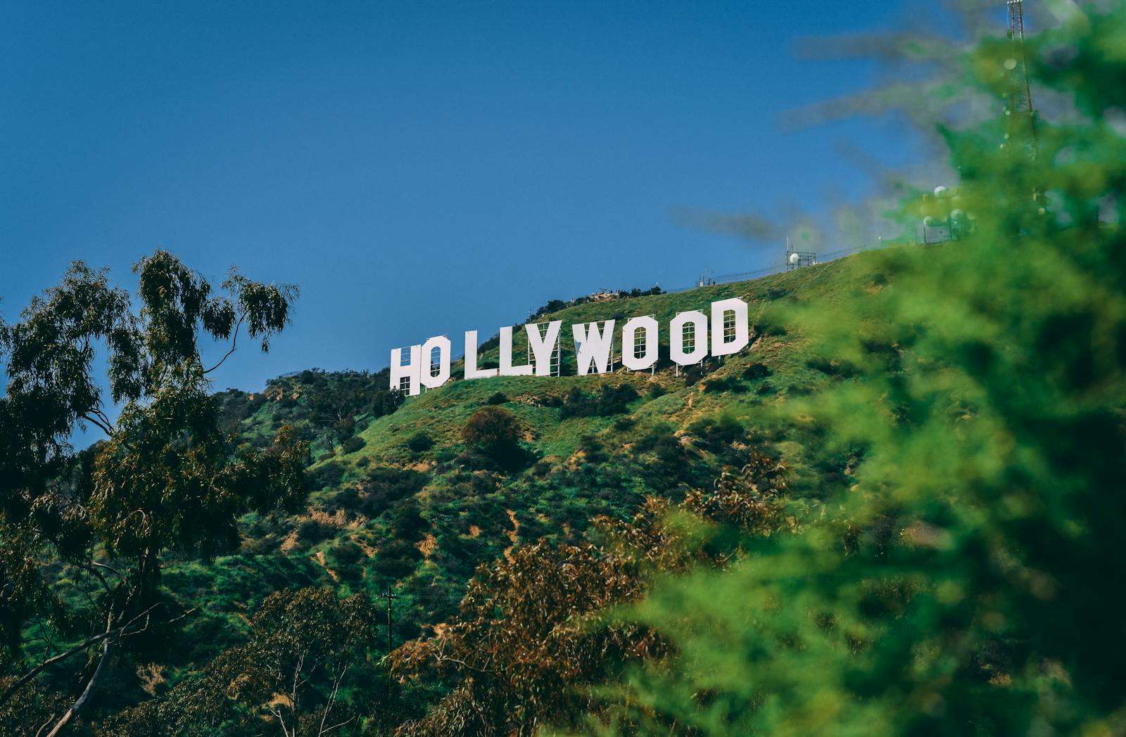 A scenic view of the famous Hollywood sign on a sunny day in Los Angeles.